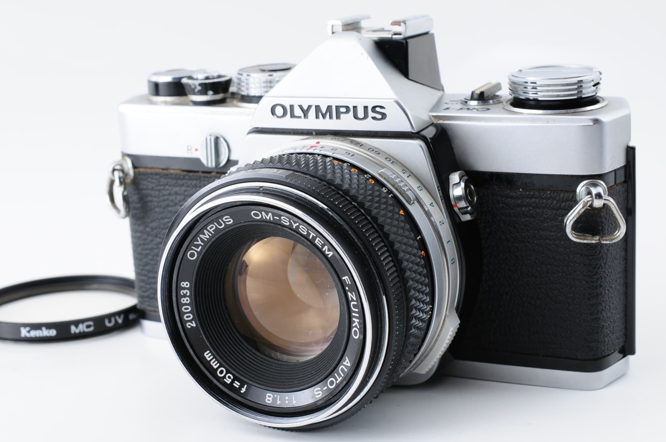 Olympus OM-1 Silver w/F.Zuiko Auto-S 50mm f/1.8 Lens