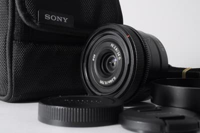 SONY FE 24mm F/2.8 G Lens Near MINT w/ Front and Rear Caps, Hood, Case, Strap
